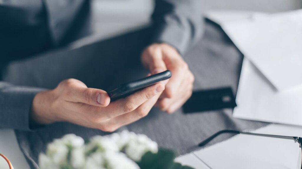Person looking at website on mobile phone